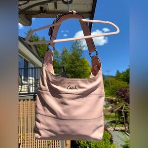 COACH Duffle/Hobo Shoulder Bag in Tuberose Saddle colour.